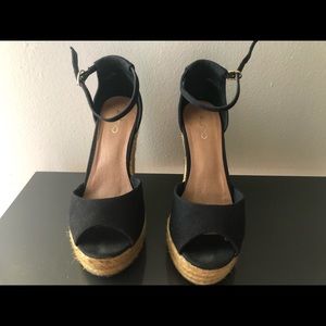 Aldo wedge sandals with ankle strap and peep toe.